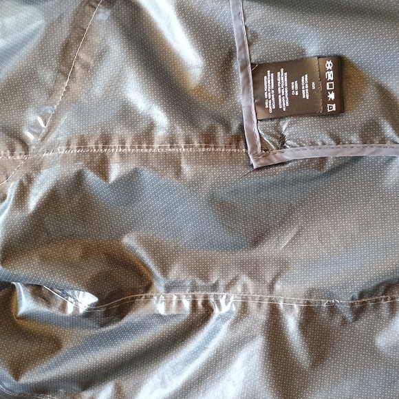 Lightweight black rain jacket with green dots, size S - Picture 7 of 7